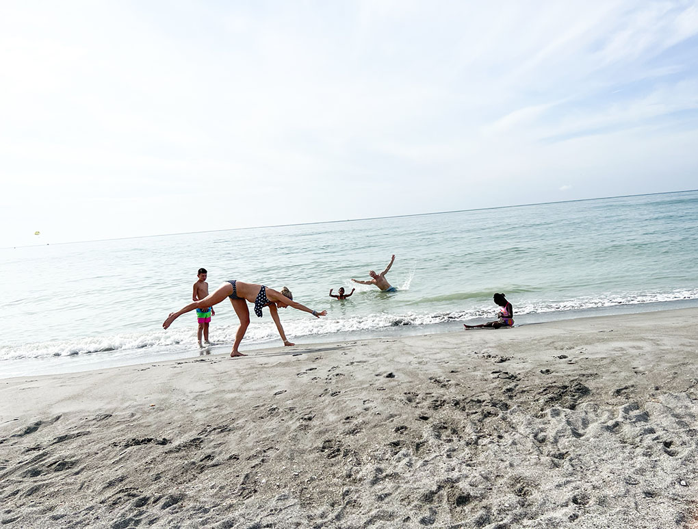 Lessons and Tattoos athymeformilkandhoney.com beach cartwheel